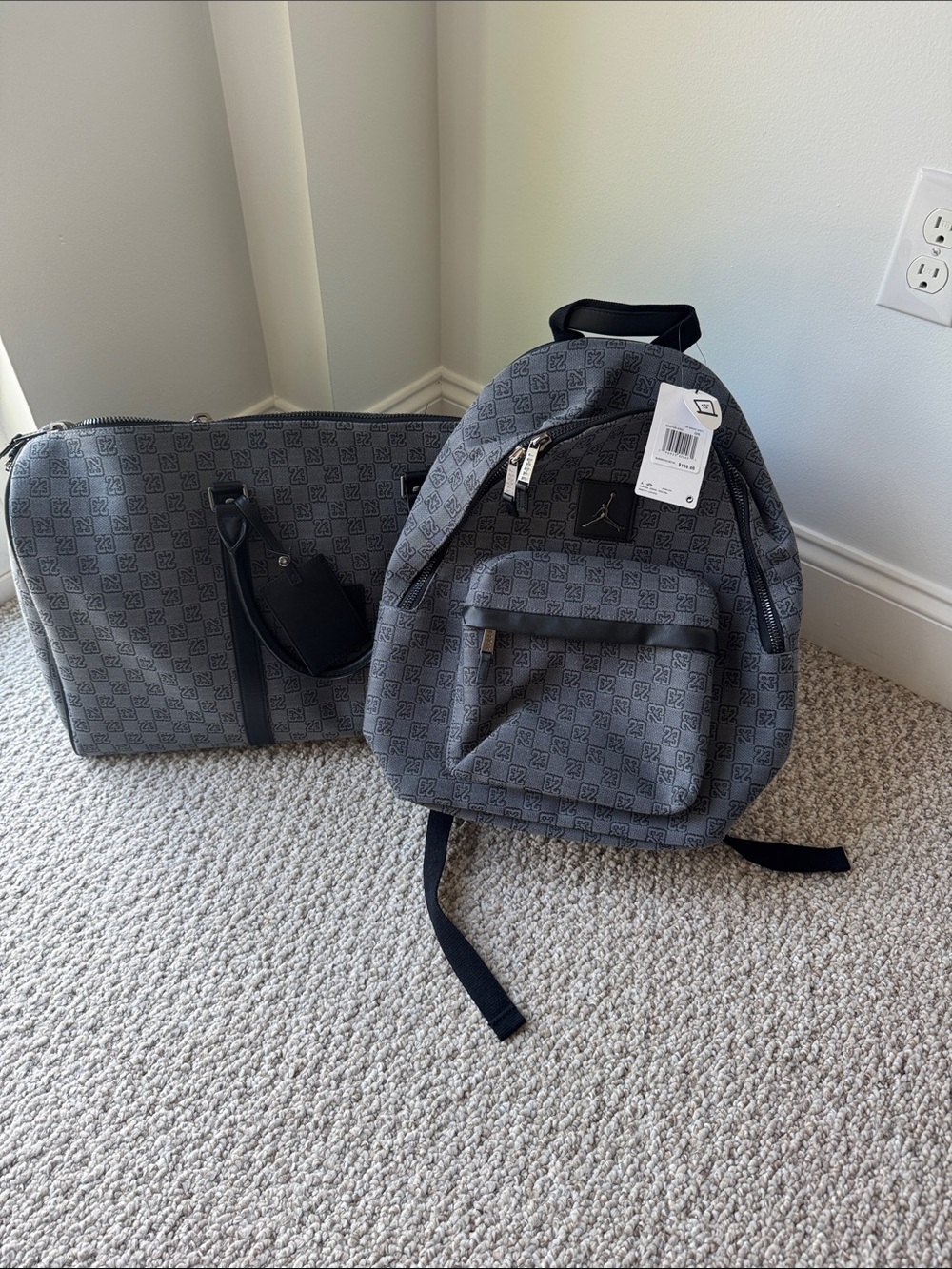 Nike Grey Monogram Backpack and Weekend Bag Set